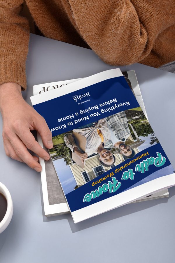 first time home buyer reviewing the path to home guide with coffeee
